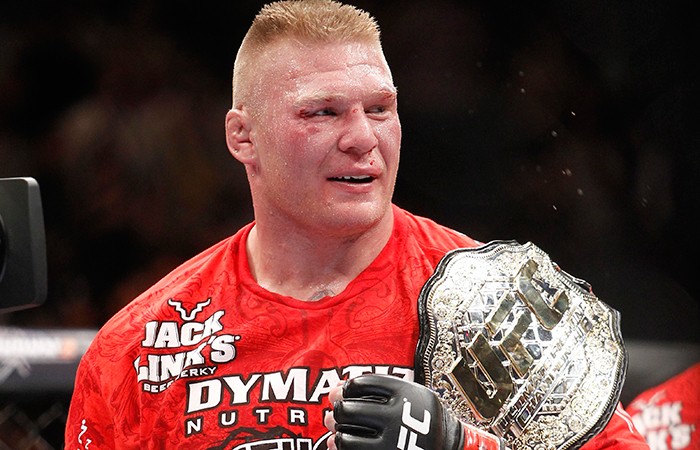 Brock Lesnar with his UFC title