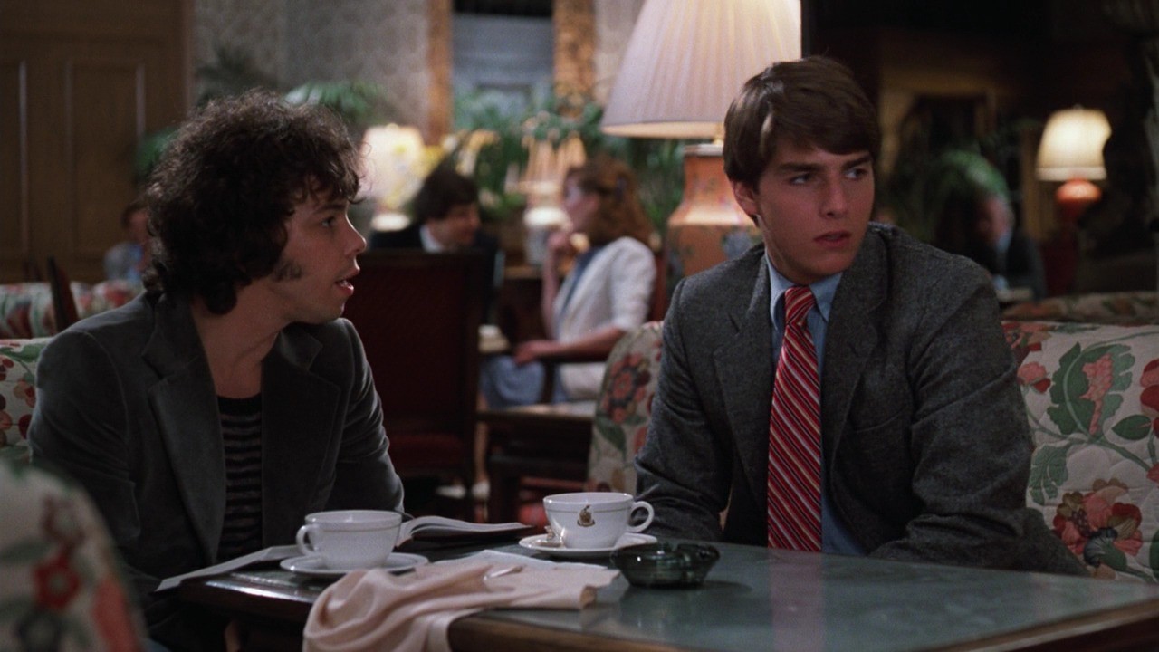 Curtis Armstrong in a scene with Tom Cruise in Risky Business