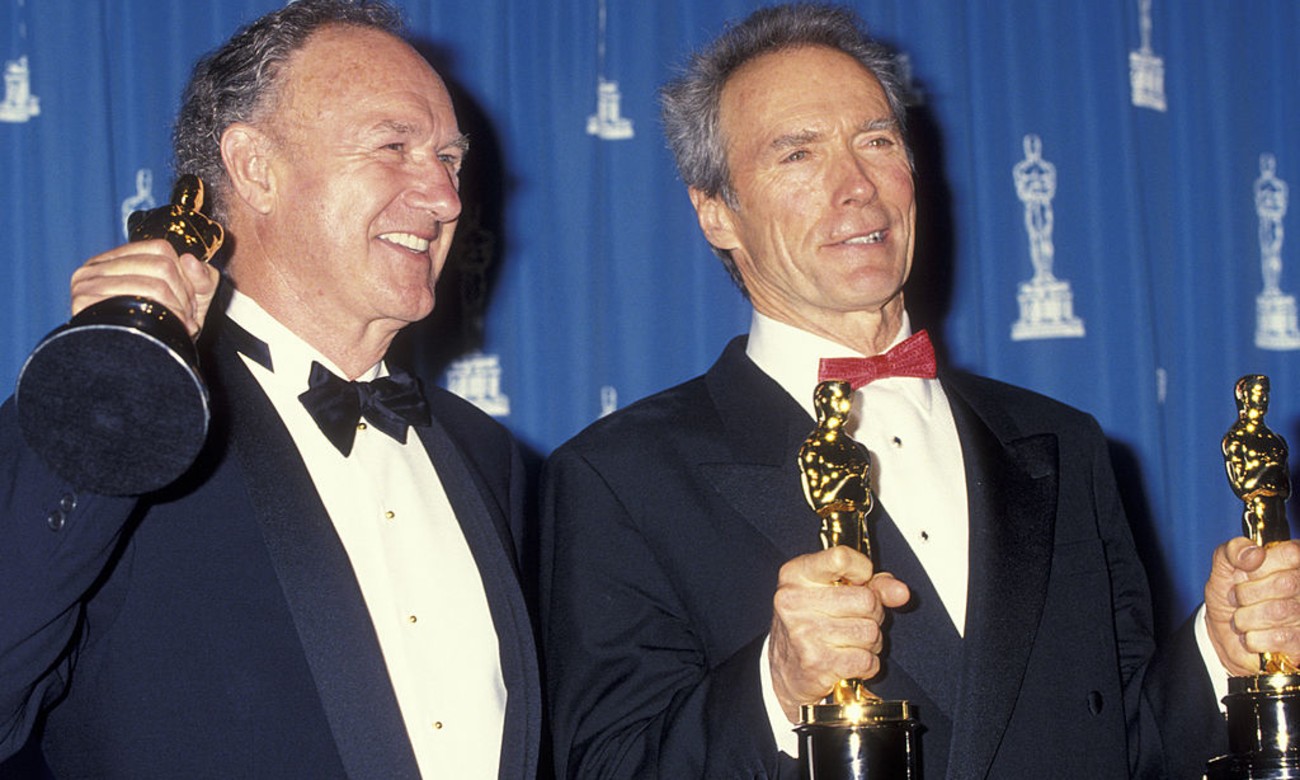 Gene Hackman and Clint Eastwood holding their Oscars