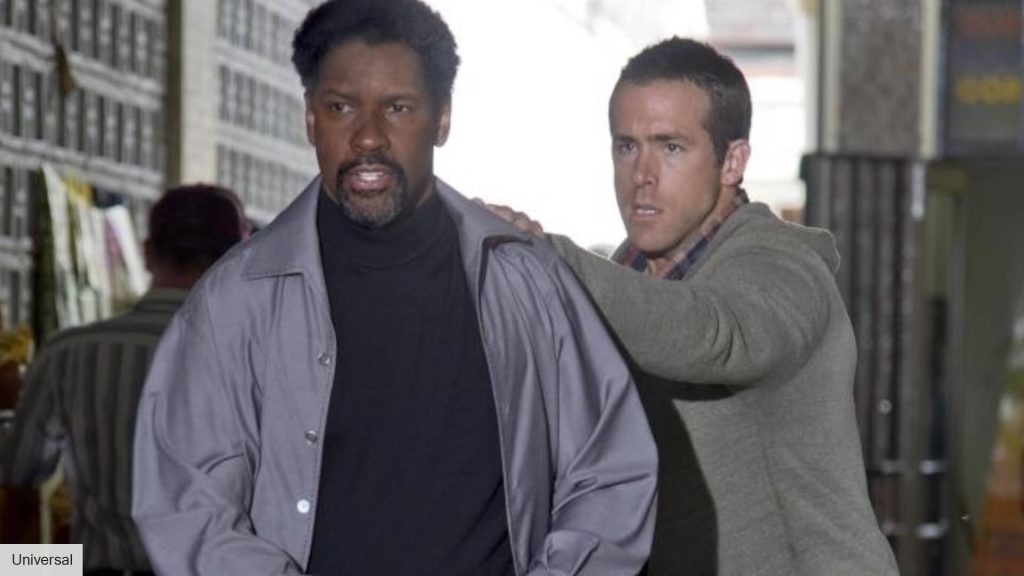 Denzel Washington and Ryan Reynolds in a still from Safe House (2012)