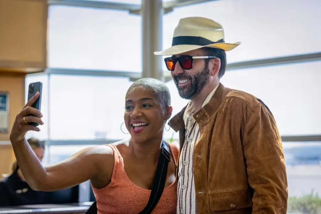 Tiffany Haddish with Nicolas Cage in a still from The Unbearable Weight of Massive Talent (2022)