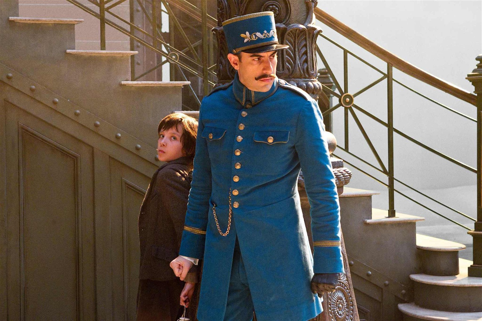Sacha Baron Cohen as Inspector Gustave