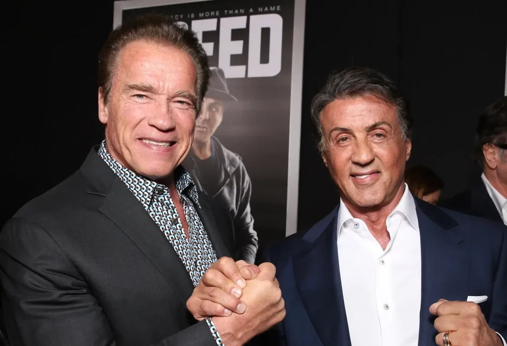 Arnold Schwarzenegger (L) with Sylvester Stallone (R)