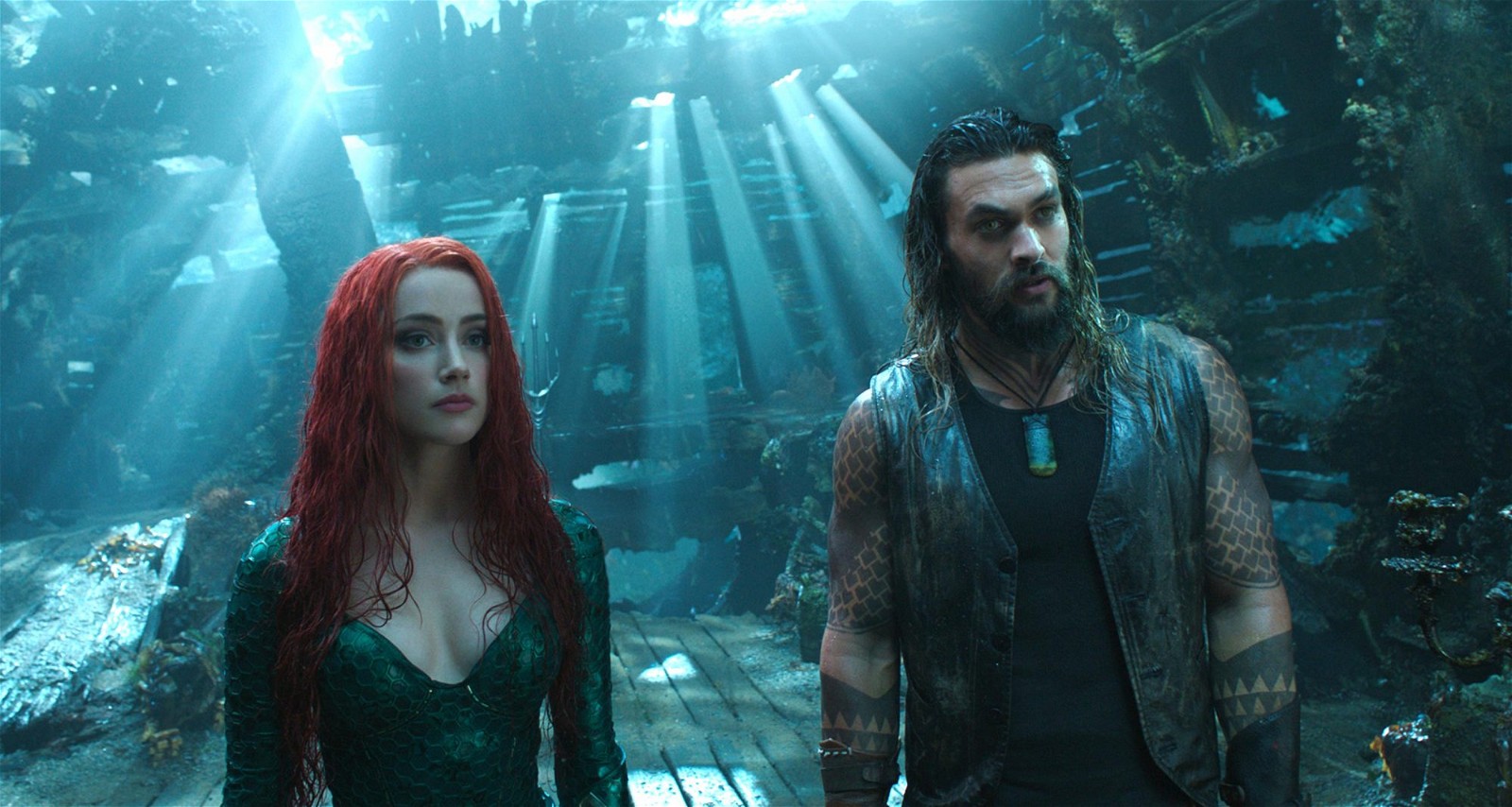 Jason Momoa and Amber Heard in a still from Aquaman
