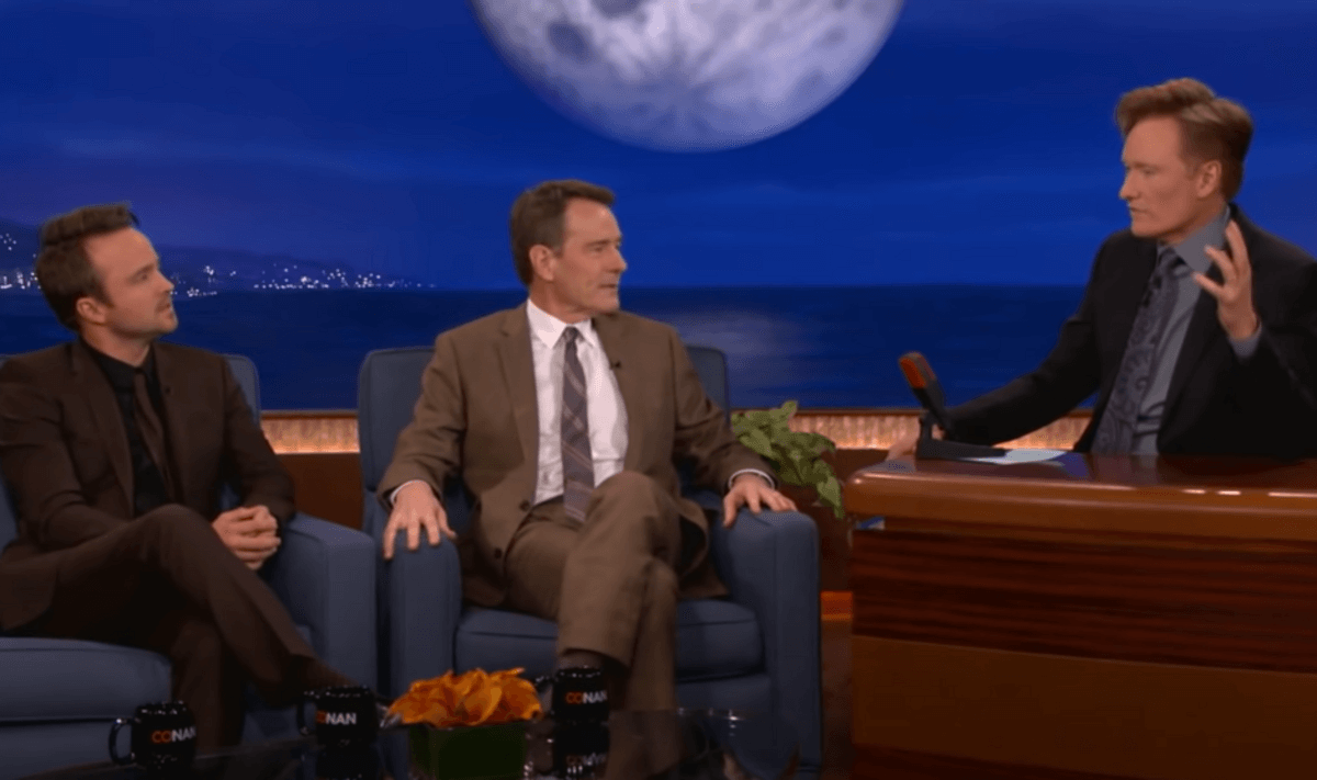 Aaron Paul and Bryan Cranston with the host Conan O'Brien on Conan