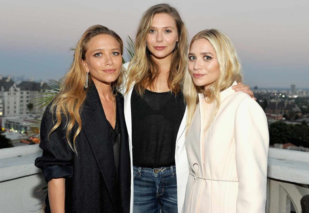 Elizabeth Olsen along with her twin sisters Ashley and Mary-Kate Olsen