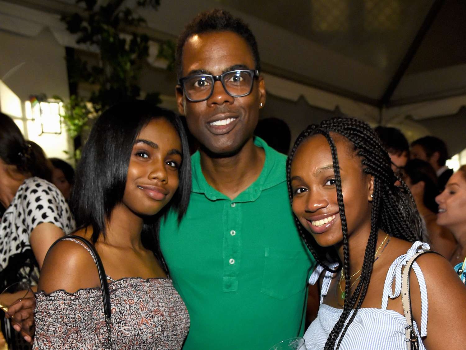 Chris Rock with his two daughters