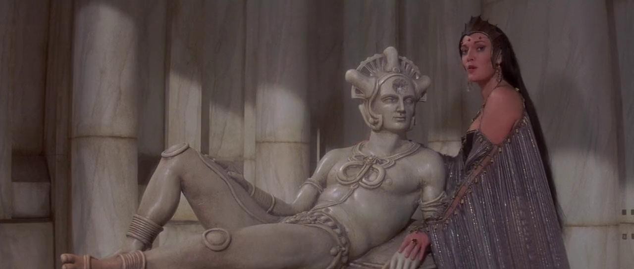 Sarah Douglas' Queen Taramis seducing the statue