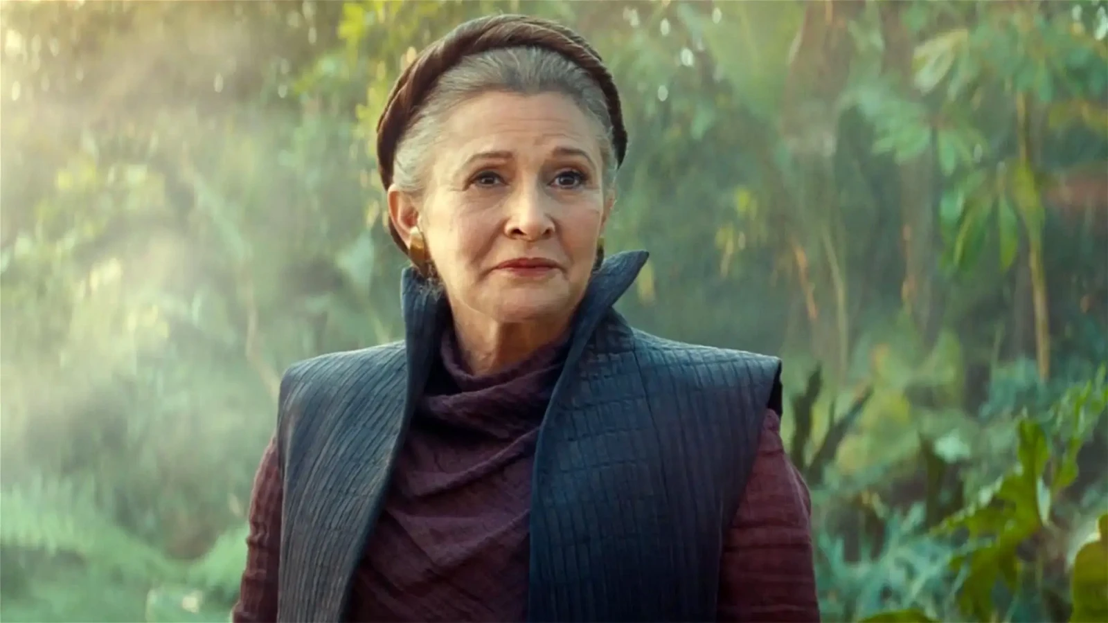 Fisher in a still from Star Wars The Force Awakens