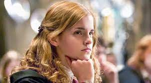 Emma Watson as Hermione Granger with her head resting on her hand in the Harry Potter films