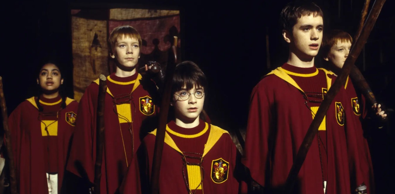 Daniel Radcliffe, center, in the first Harry Potter film, with, from left, Leilah Sutherland, James Phelps, Sean Biggerstaff and Oliver Phelps. Credit...