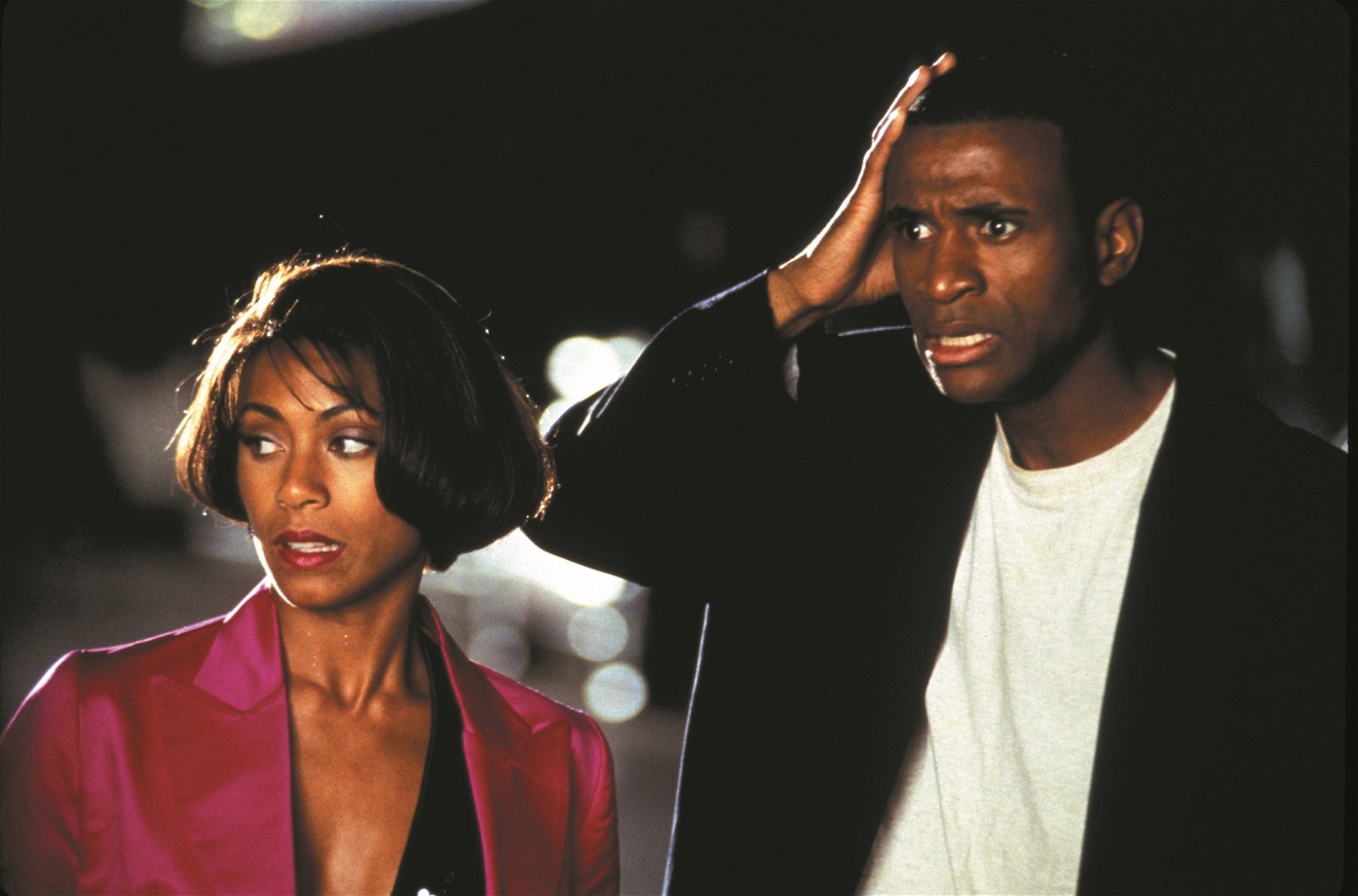 Jada Pinkett Smith and Tommy Davidson in a scene from Woo