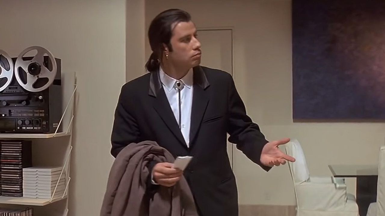 John Travolta as Vincent Vega in Pulp Fiction (1994)
