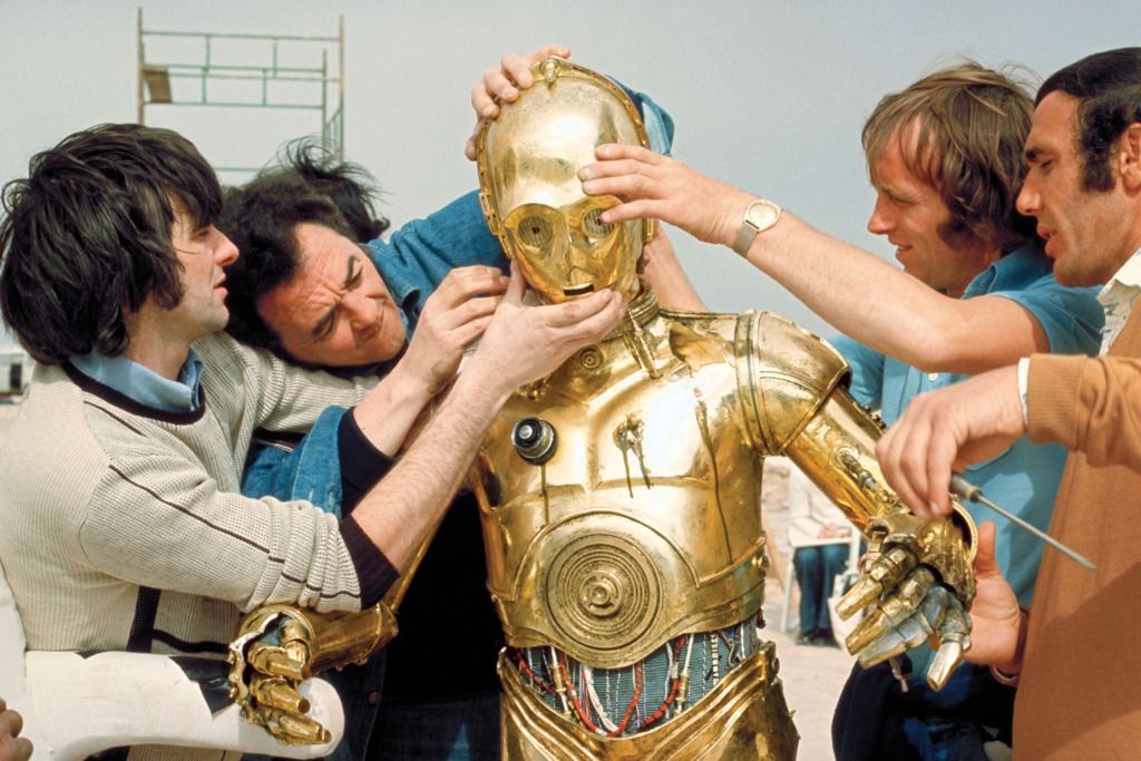 Anthony Daniels getting into the C-3PO costume