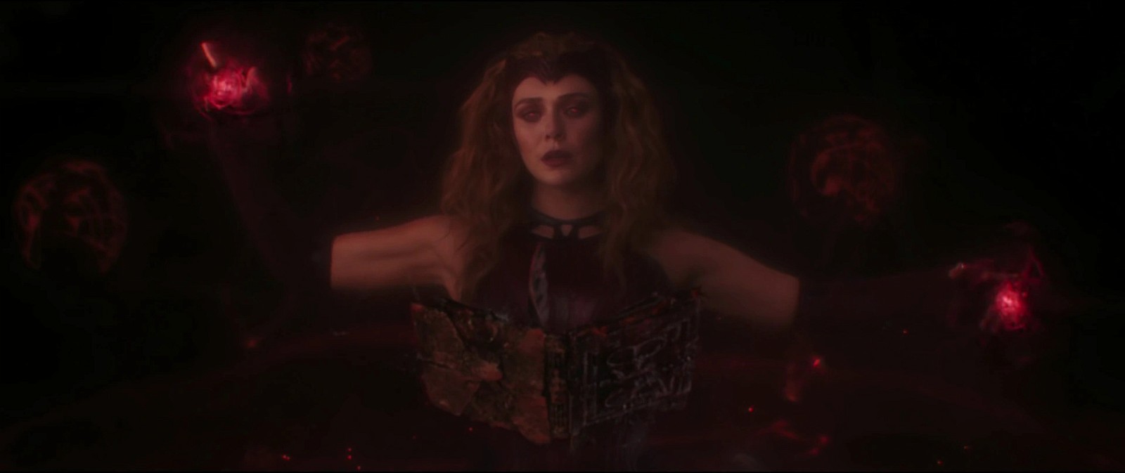 Elizabeth Olsen's Scarlet Witch reading the Darkhold