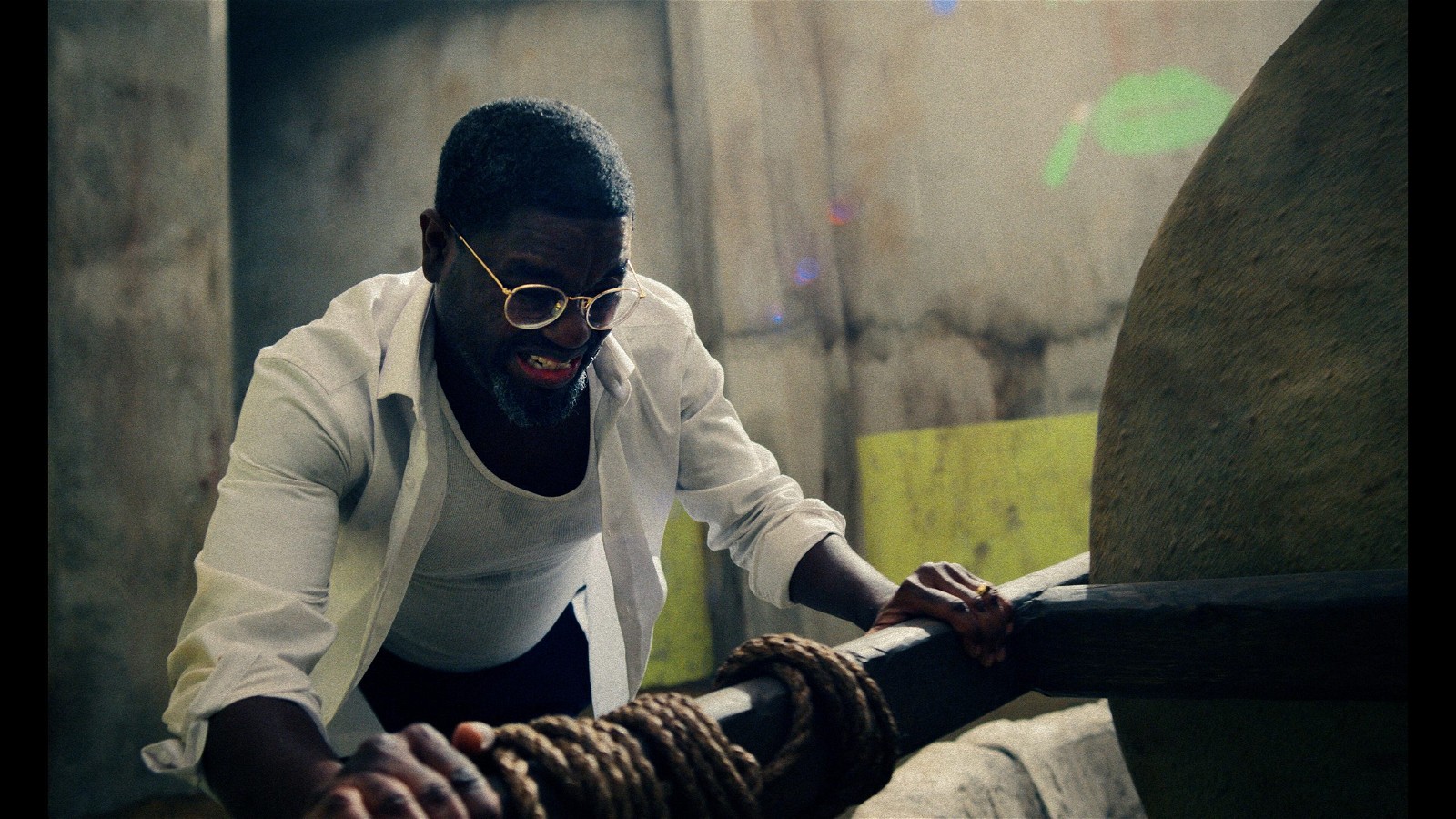 The Mill -- A businessman (Lil Rel Howery) wakes up beside an ancient grist mill situated in the center of an open-air prison cell with no idea how he got there. Forced to work as a beast of burden to stay alive, he must find a way to escape before the birth of his child. Joe Stevens (Lil Rel Howery), shown. (Photo: Courtesy of Hulu)