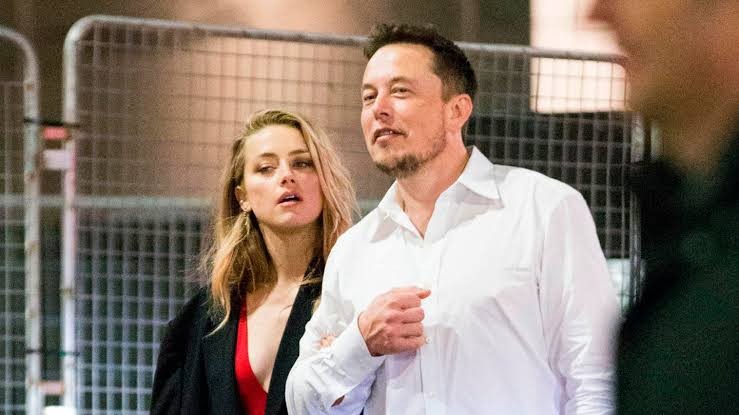 Elon Musk with Amber Heard