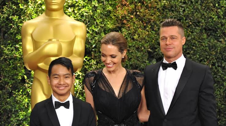 Brad Pitt and Angelina Jolie with their first child, Maddox Chivan Jolie-Pitt