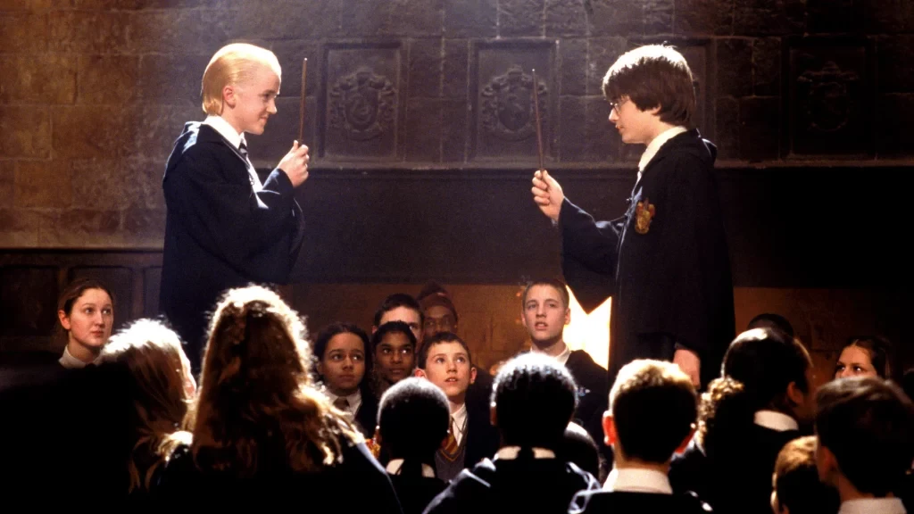 Harry Potter (Daniel Radcliffe) and Draco Malfoy (Tom Felton)