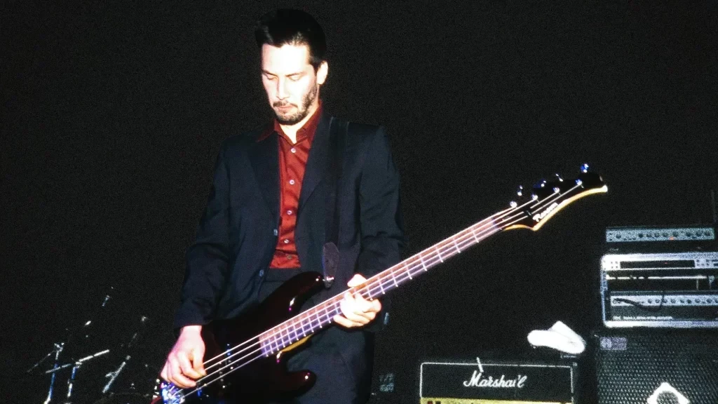 Keanu Reeves playing bass