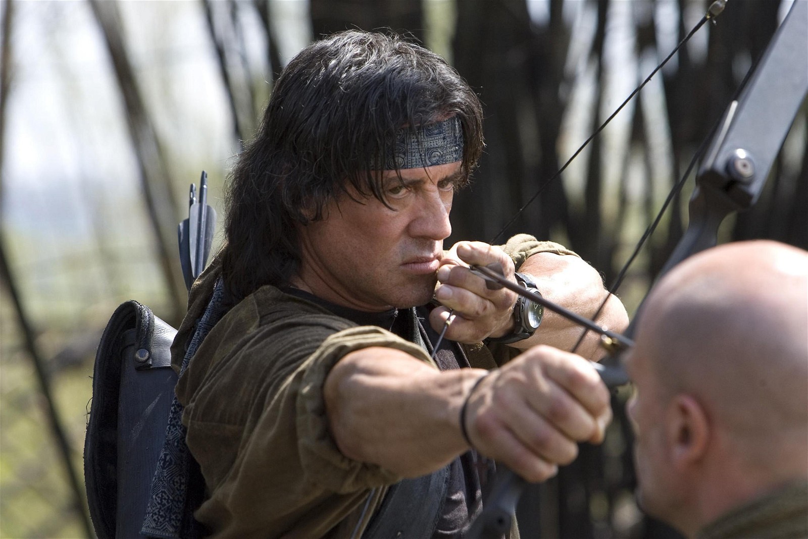 Sylvester Stallone in and as Rambo