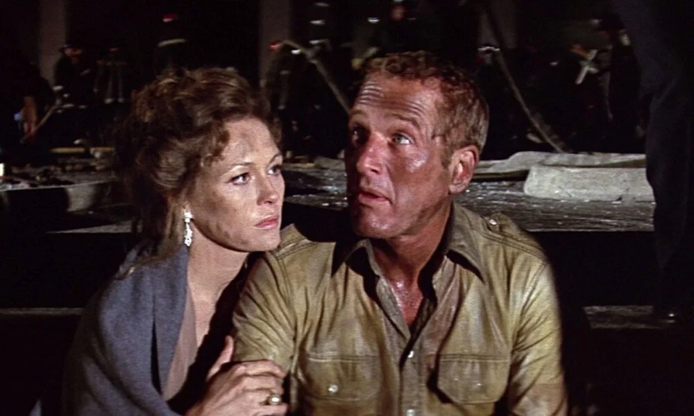 Paul Newman with his co-star in a scene in The Towering Inferno