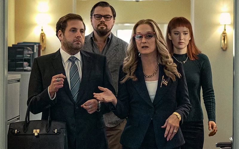 Jonah Hill, Leonardo DiCaprio, Meryl Streep, and Jennifer Lawrence, all walking together in Don't Look Up