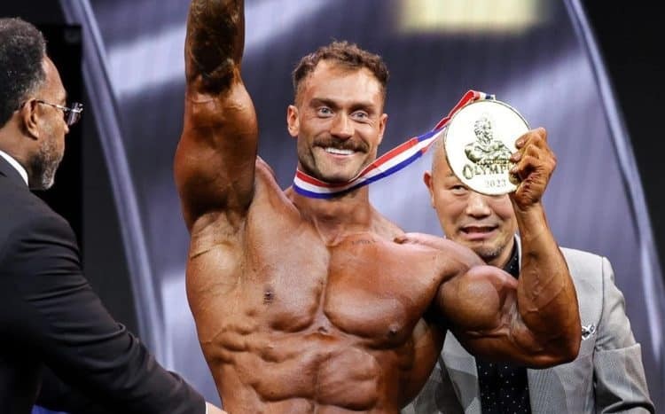 Chris Bumstead winning his fifth Mr. Olympia Classic Physique title 