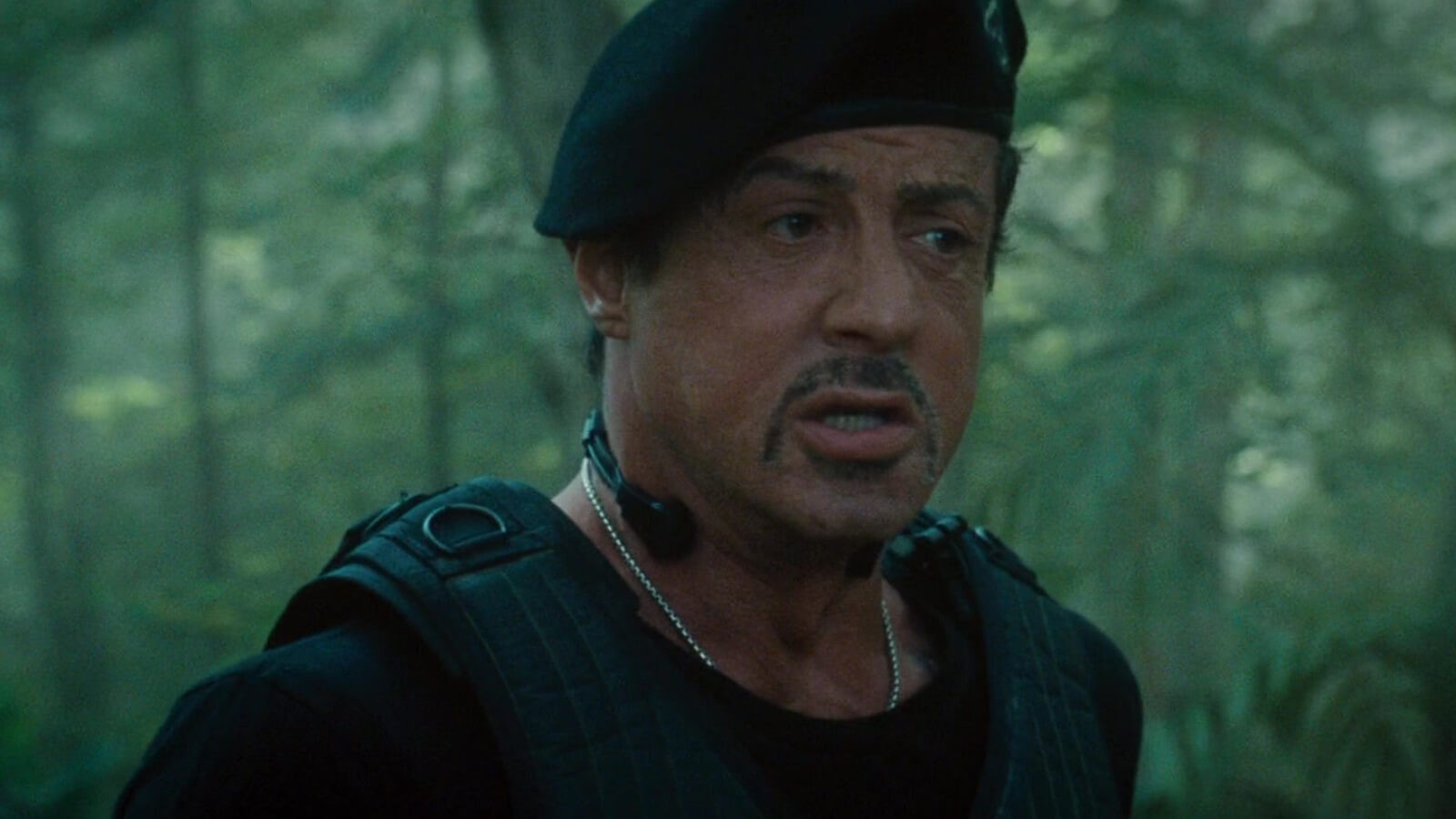 Sylvester Stallone looking mortified in The Expendables