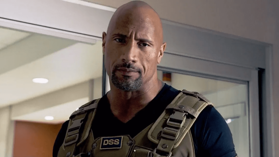 Dwayne Johnson looking on in 'Fast and Furious'