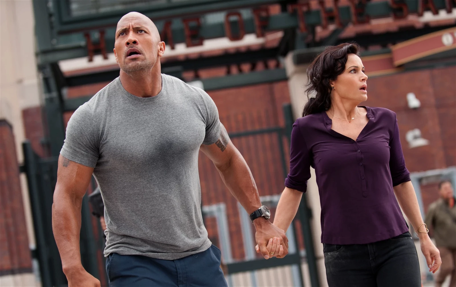 Dwayne "The Rock" Johnson and Carla Gugino star in the action thriller San Andreas.