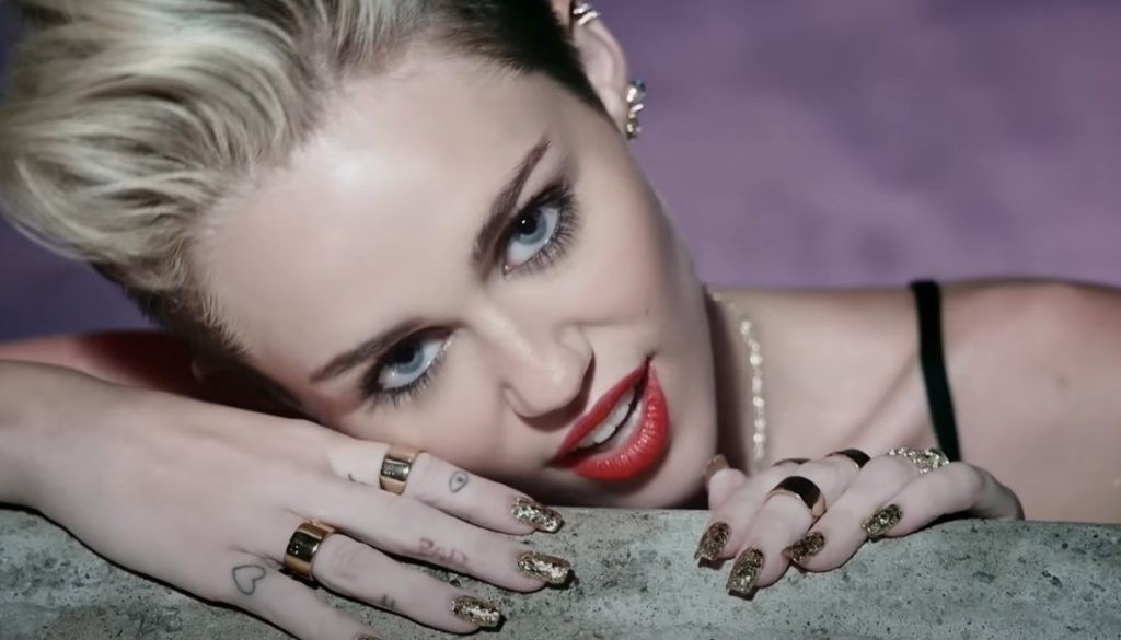 Miley Cyrus in the 'We Can't Stop' MV (via YouTube)