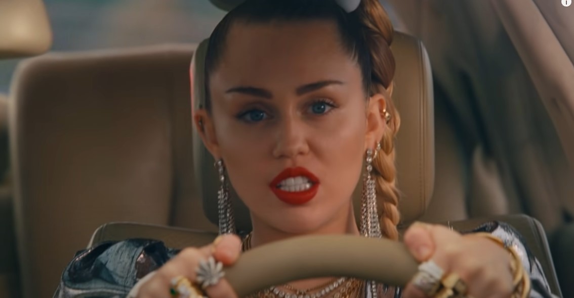Miley Cyrus in Mark Ronson's 'Nothing Breaks Like a Heart' Official MV (via YouTube)