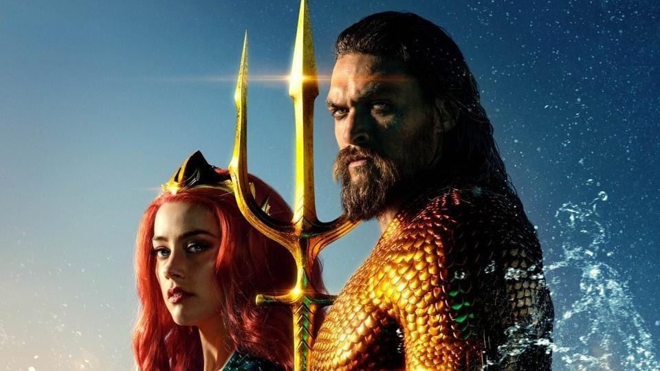 Amber Heard and Jason Momoa together in this photo while looking serious