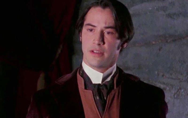 Keanu Reeves being curious by something in this scene from Bram Stoker's Dracula
