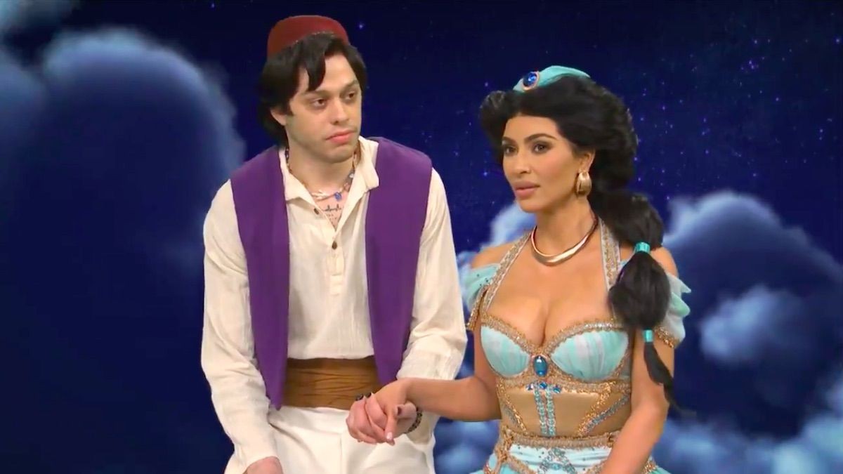 Kim Kardashian and Pete Davidson enacting an Aladdin skit during Saturday Night Live 