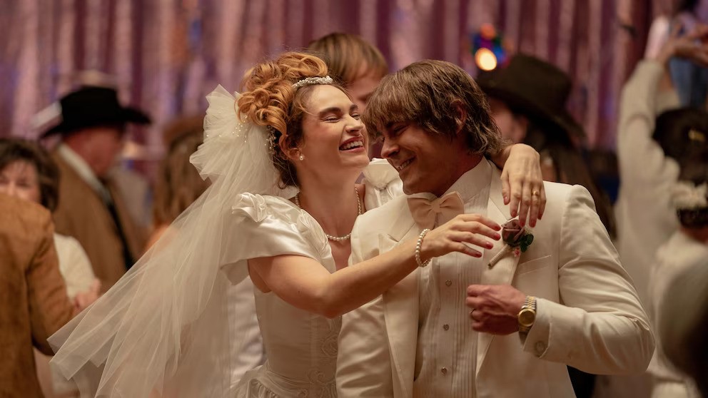 Lily James, left, and Zac Efron in a scene from "The Iron Claw." 
