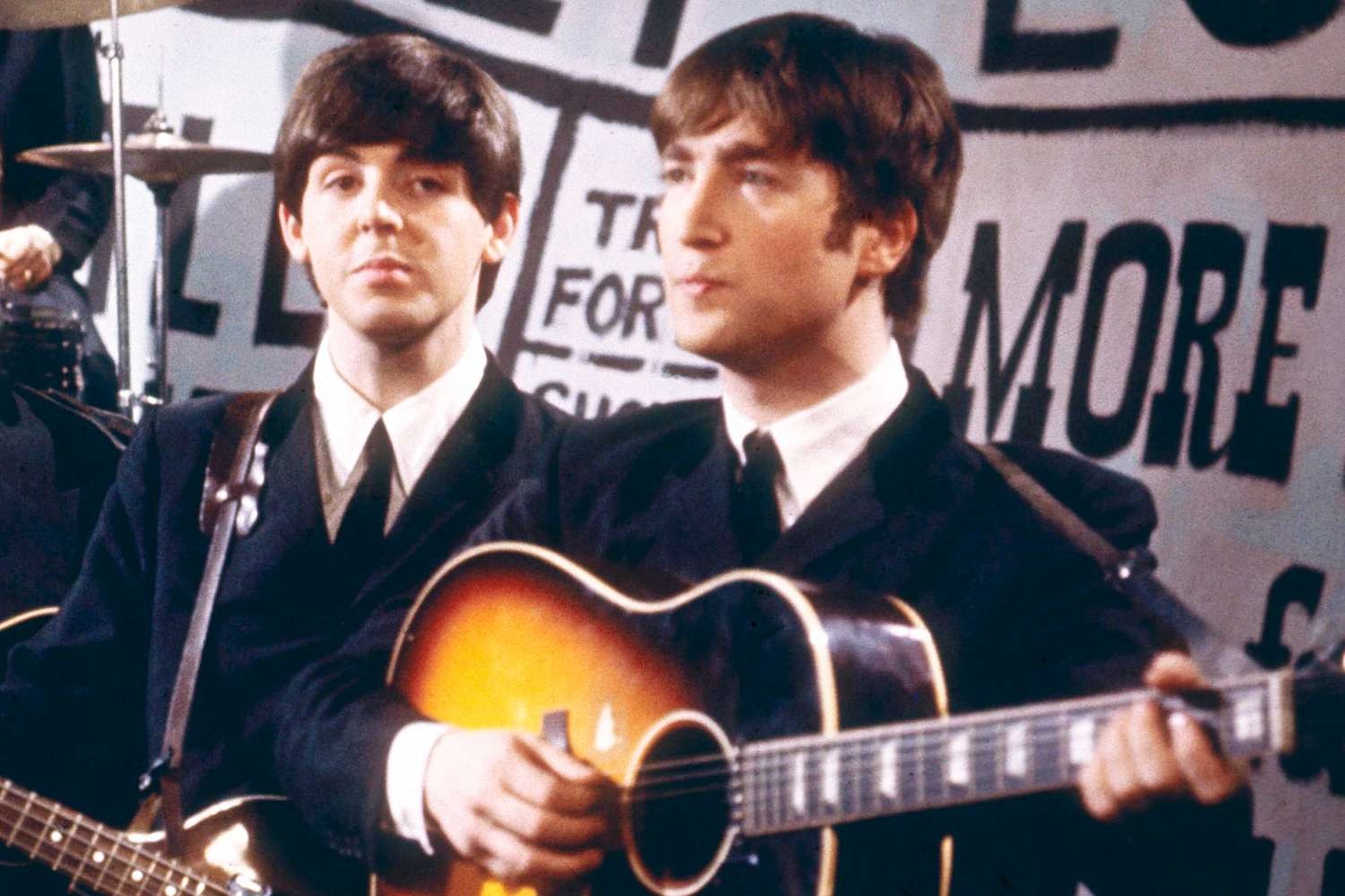 Paul McCartney and John Lennon during a Beatles performance