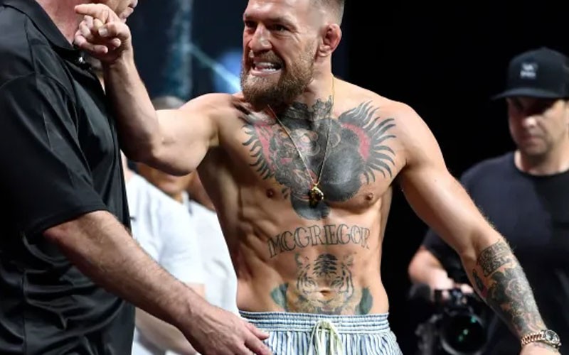 Conor McGregor pointing at his opponent during a face off