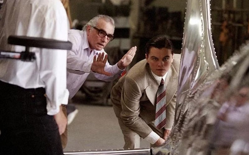 Martin Scorsese and Leonardo DiCaprio while working on a scene together for a movie 