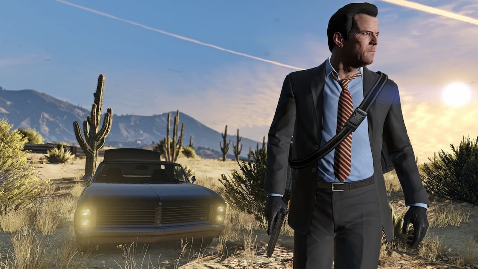 GTA 5 protagonist Michael standing in a desert, behind him a car