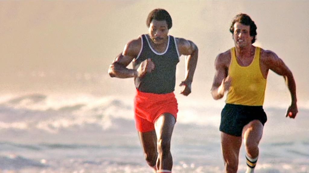 Carl Weathers and Sylvester Stallone in a still from Rocky III