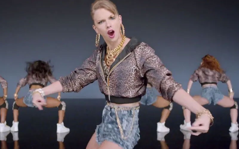 Taylor Swift during a famous sequence from her song 'Shake It Off' 
