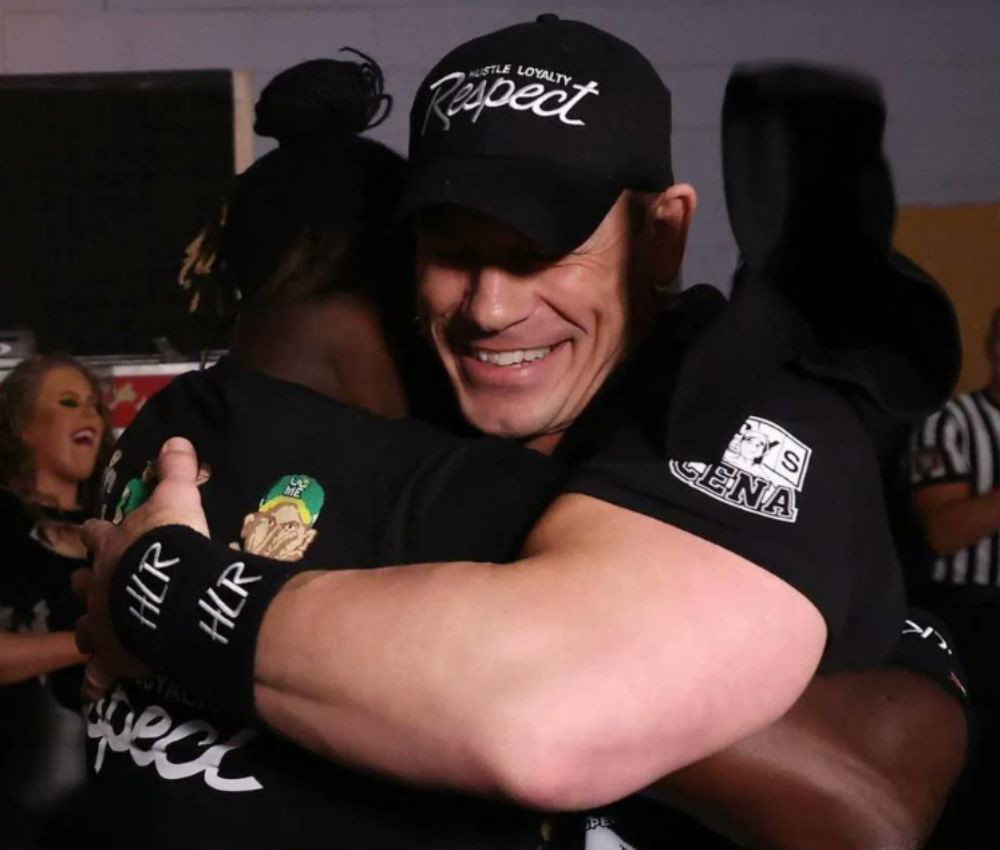 John Cena hugging former WWE rival R-Truth (via @WrestlingWCC | X)