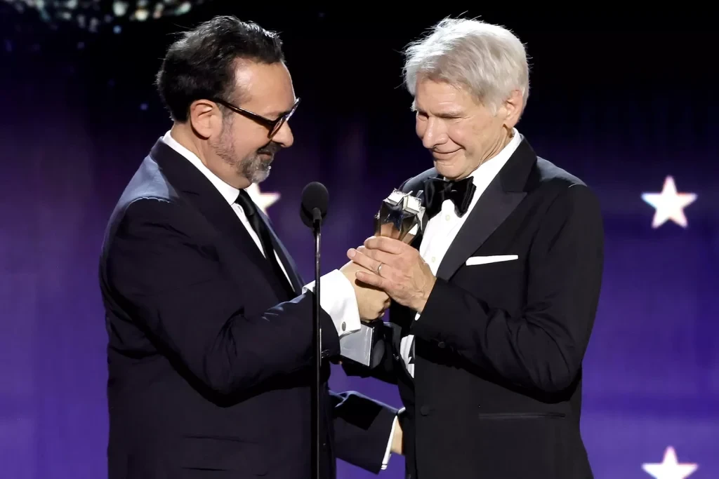 James Mangold presents Harrison Ford with the Career Achievement Award during the 29th annual Critics Choice Awards | Image via CNN