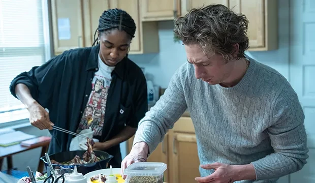 Ayo Edebiri and Jeremy Allen White in a still from The Bear