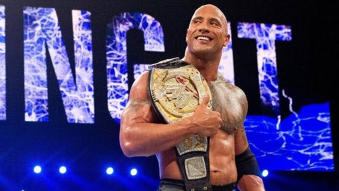 Dwayne Johnson with the WWE Title