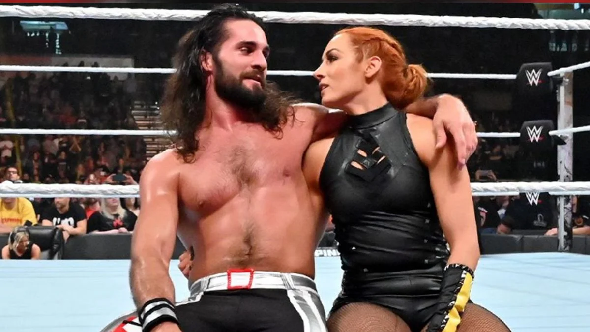 Seth Rollins and Becky Lynch sharing a moment in the ring