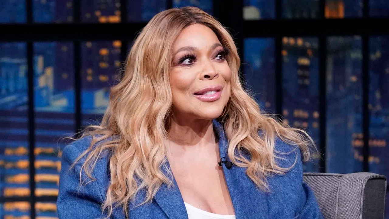 Wendy Williams smiling as part of a talk show 
