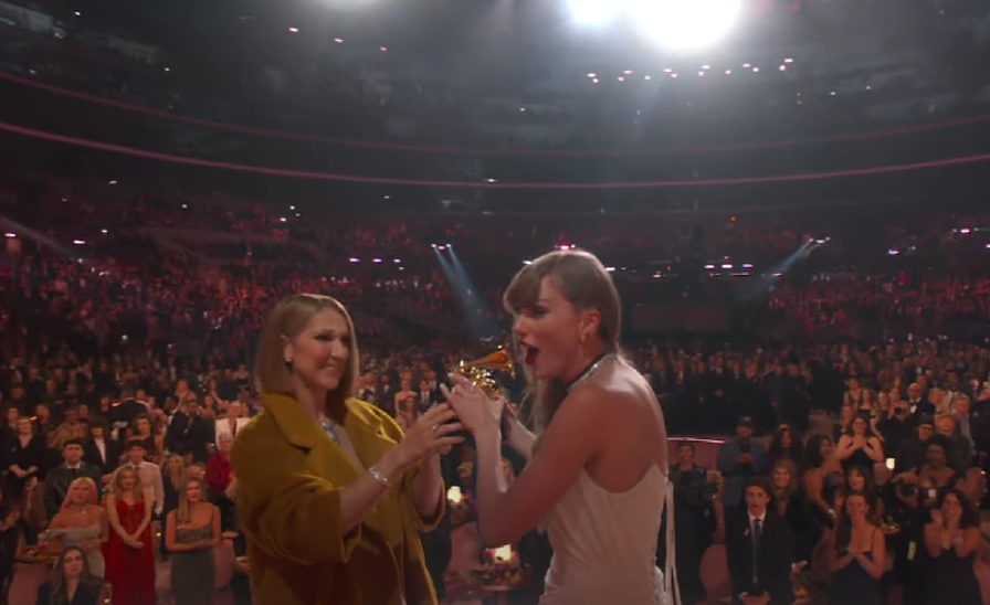 Taylor Swift receiving Best Album of the Year award from Celine Dion
